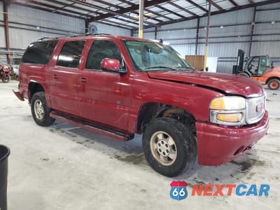 Czwarte zdjęcie samochodu z boku: 2006 GMC YUKON XL DENALI VIN:1GKFK66U36J147969 - miniatura