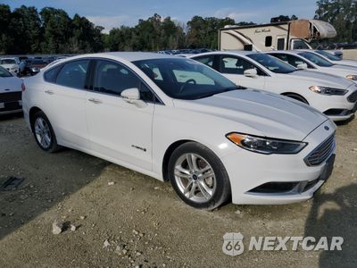 Czwarte zdjęcie samochodu z boku: 2018 FORD FUSION SE HYBRID VIN:3FA6P0LU9JR129897 - miniatura