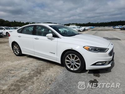 Czwarte zdjęcie samochodu z boku: 2017 FORD FUSION SE HYBRID VIN:3FA6P0LU0HR410111 - miniatura