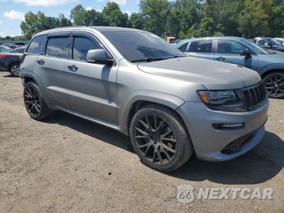 Czwarte zdjęcie samochodu z boku: 2015 JEEP GRAND CHEROKEE SRT-8 VIN:1C4RJFDJ1FC182227 - miniatura