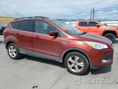 Czwarte zdjęcie samochodu z boku: 2016 FORD ESCAPE SE VIN:1FMCU9GX6GUA10782 - miniatura