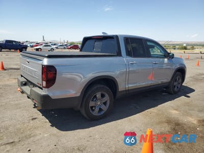 Trzecie zdjęcie samochodu z tyłu: 2024 HONDA RIDGELINE TRAIL SPORT VIN:5FPYK3F66RB019099 - miniatura