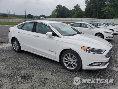 Czwarte zdjęcie samochodu z boku: 2017 FORD FUSION SE HYBRID VIN:3FA6P0LUXHR400699 - miniatura