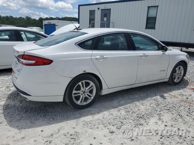Trzecie zdjęcie samochodu z tyłu: 2018 FORD FUSION SE HYBRID VIN:3FA6P0LU5JR281921 - miniatura