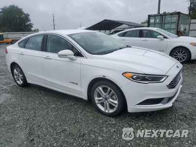 Czwarte zdjęcie samochodu z boku: 2018 FORD FUSION SE HYBRID VIN:3FA6P0LU1JR278675 - miniatura
