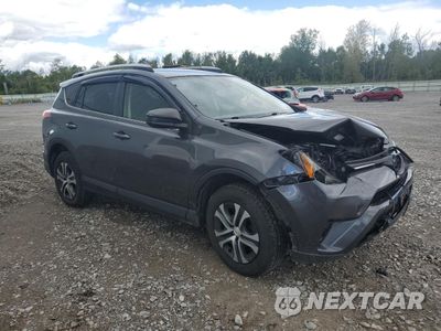 Czwarte zdjęcie samochodu z boku: 2018 TOYOTA RAV4 LE VIN:JTMBFREV7JJ221770 - miniatura