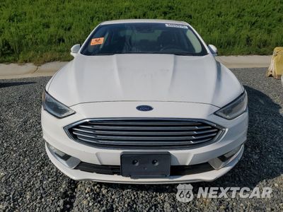 Piąte zdjęcie samochodu w środku: 2017 FORD FUSION SE HYBRID VIN:3FA6P0LUXHR409676 - miniatura
