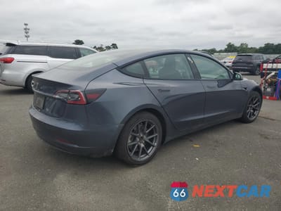 Trzecie zdjęcie samochodu z tyłu: 2022 TESLA MODEL 3 VIN:5YJ3E1EA8NF202146 - miniatura