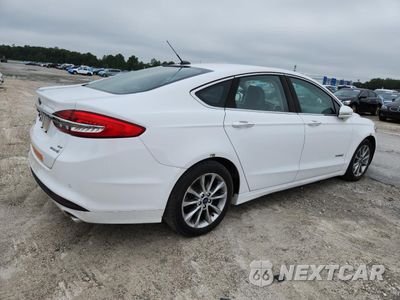 Trzecie zdjęcie samochodu z tyłu: 2017 FORD FUSION SE HYBRID VIN:3FA6P0LUXHR409242 - miniatura