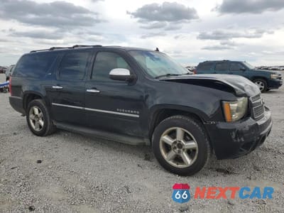 Czwarte zdjęcie samochodu z boku: 2011 CHEVROLET SUBURBAN K1500 LTZ VIN:1GNSKKE30BR101577 - miniatura