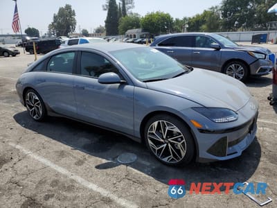 Czwarte zdjęcie samochodu z boku: 2024 HYUNDAI IONIQ 6 SEL VIN:KMHM34AA1RA073825 - miniatura