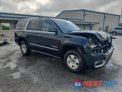 Czwarte zdjęcie samochodu z boku: 2015 GMC YUKON DENALI VIN:1GKS2CKJXFR292646 - miniatura