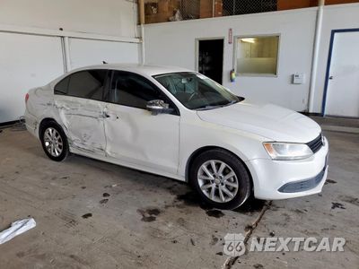 Czwarte zdjęcie samochodu z boku: 2011 VOLKSWAGEN JETTA SE VIN:3VWDZ7AJ9BM357326 - miniatura