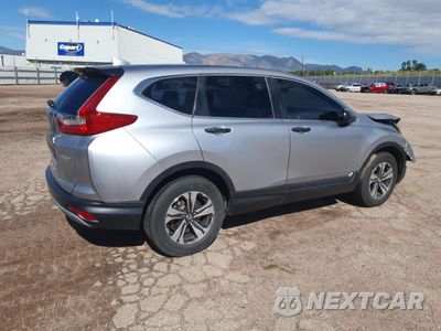 Trzecie zdjęcie samochodu z tyłu: 2018 HONDA CR-V LX VIN:2HKRW6H30JH212716 - miniatura