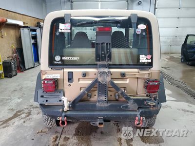 Zdjęcie 6 z 14 samochodu: 1999 JEEP WRANGLER / TJ SPORT VIN:1J4FY19S1XP492501 - miniatura