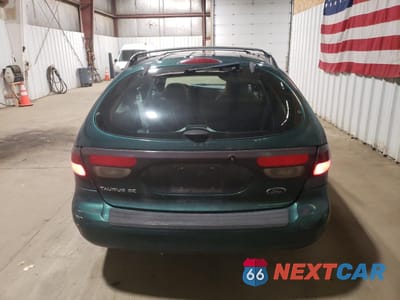 Zdjęcie 6 z 13 samochodu: 2000 FORD TAURUS SE VIN:1FAFP5828YG225641 - miniatura