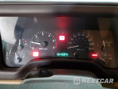 Zdjęcie 9 z 14 samochodu: 1999 JEEP WRANGLER / TJ SPORT VIN:1J4FY19S1XP492501 - miniatura