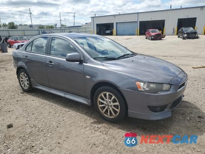 Czwarte zdjęcie samochodu z boku: 2010 MITSUBISHI LANCER ES/ES SPORT VIN:JA32U2FU0AU016601 - miniatura