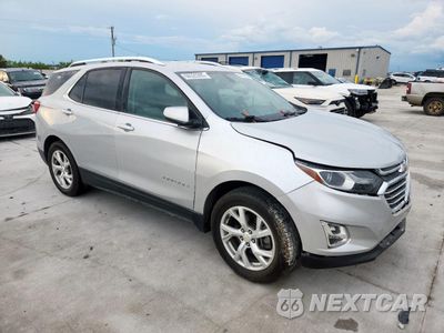 Czwarte zdjęcie samochodu z boku: 2019 CHEVROLET EQUINOX LT VIN:2GNAXLEX2K6139118 - miniatura