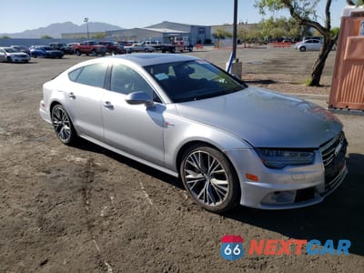 Czwarte zdjęcie samochodu z boku: 2016 AUDI A7 PREMIUM PLUS VIN:WAUWGAFC4GN091328 - miniatura