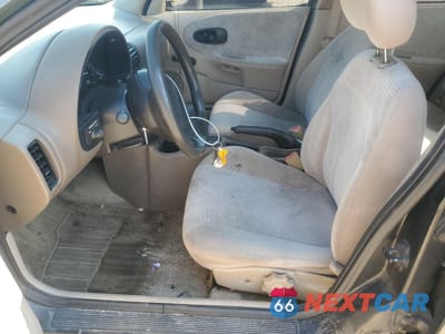 Zdjęcie 7 z 14 samochodu: 1999 SATURN SL2 VIN:1G8ZK527XXZ278333 - miniatura