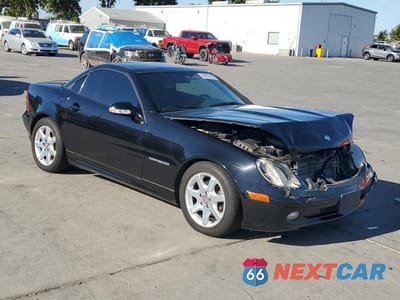 Czwarte zdjęcie samochodu z boku: 2003 MERCEDES-BENZ SLK 230 KOMPRESSOR VIN:WDBKK49F33F280207 - miniatura