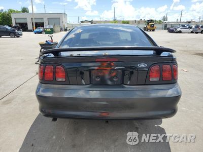Zdjęcie 6 z 12 samochodu: 1998 FORD MUSTANG VIN:1FAFP4040WF182956 - miniatura