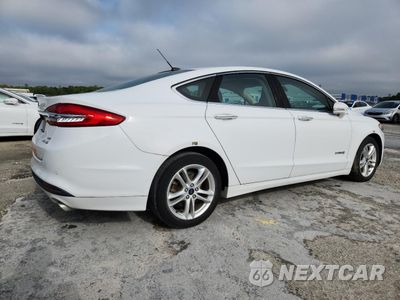 Trzecie zdjęcie samochodu z tyłu: 2018 FORD FUSION SE HYBRID VIN:3FA6P0LU6JR278719 - miniatura