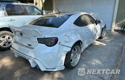 Czwarte zdjęcie samochodu z boku: 2014 TOYOTA SCION FR-S VIN:JF1ZNAA13E9703882 - miniatura