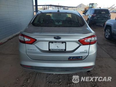Zdjęcie 6 z 12 samochodu: 2014 FORD FUSION SE HYBRID VIN:3FA6P0LU6ER317489 - miniatura