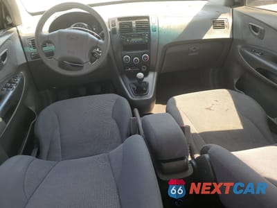 Zdjęcie 8 z 13 samochodu: 2006 HYUNDAI TUCSON GL VIN:KM8JM12B36U298876 - miniatura