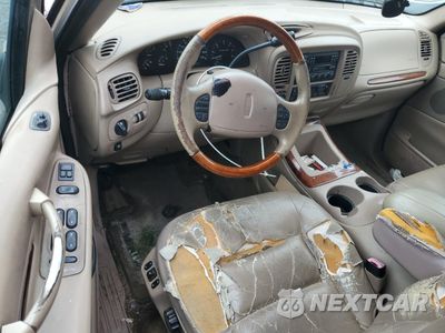 Zdjęcie 8 z 13 samochodu: 1998 LINCOLN NAVIGATOR VIN:5LMFU28L2WLJ04322 - miniatura