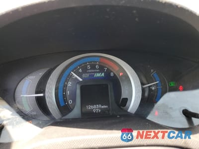 Zdjęcie 9 z 12 samochodu: 2010 HONDA INSIGHT EX VIN:JHMZE2H71AS039836 - miniatura