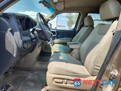 Zdjęcie 7 z 13 samochodu: 2010 HONDA RIDGELINE RTS VIN:5FPYK1F4XAB009800 - miniatura