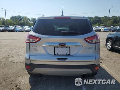 Zdjęcie 6 z 12 samochodu: 2016 FORD ESCAPE TITANIUM VIN:1FMCU0J93GUC64715 - miniatura