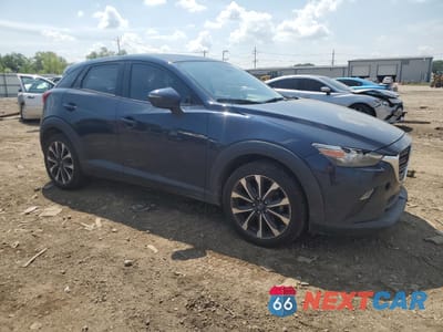 Czwarte zdjęcie samochodu z boku: 2019 MAZDA CX-3 TOURING VIN:JM1DKFC70K0426412 - miniatura