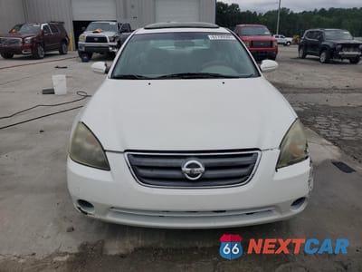 Piąte zdjęcie samochodu w środku: 2003 NISSAN ALTIMA BASE VIN:1N4AL11D63C242836 - miniatura