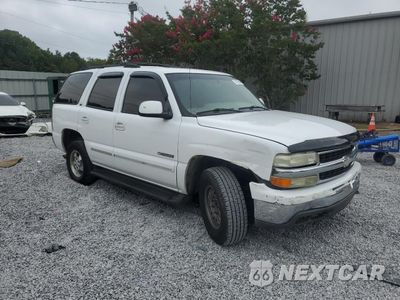 Czwarte zdjęcie samochodu z boku: 2002 CHEVROLET TAHOE C1500 VIN:1GNEC13Z02R226915 - miniatura
