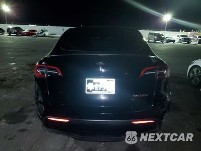 Zdjęcie 6 z 12 samochodu: 2022 TESLA MODEL Y VIN:7SAYGDEF7NF329762 - miniatura