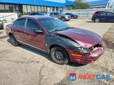 Czwarte zdjęcie samochodu z boku: 2002 SATURN SL1 VIN:1G8ZH52842Z312766 - miniatura