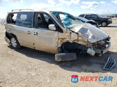Czwarte zdjęcie samochodu z boku: 2002 HONDA ODYSSEY EXL VIN:2HKRL18082H579172 - miniatura