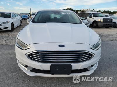 Piąte zdjęcie samochodu w środku: 2017 FORD FUSION SE HYBRID VIN:3FA6P0LU6HR409237 - miniatura