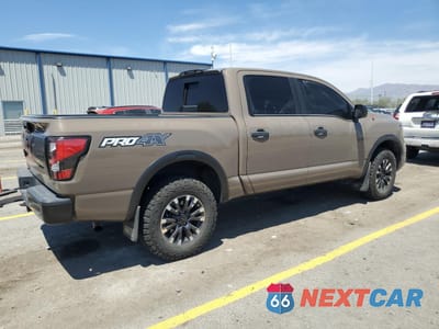 Trzecie zdjęcie samochodu z tyłu: 2021 NISSAN TITAN SV VIN:1N6AA1ED9MN512607 - miniatura