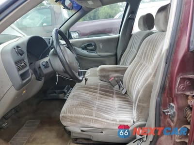 Zdjęcie 7 z 14 samochodu: 2001 CHEVROLET LUMINA VIN:2G1WL52J011254665 - miniatura