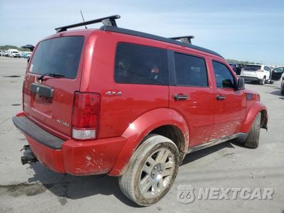 Trzecie zdjęcie samochodu z tyłu: 2011 DODGE NITRO HEAT VIN:1D4PU4GK0BW605849 - miniatura