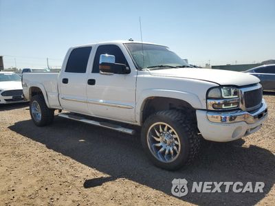 Czwarte zdjęcie samochodu z boku: 2003 GMC SIERRA K1500 HEAVY DUTY VIN:1GTGK13U23F158547 - miniatura