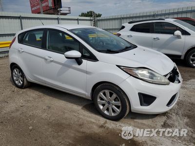 Czwarte zdjęcie samochodu z boku: 2012 FORD FIESTA SE VIN:3FADP4EJ7CM219129 - miniatura