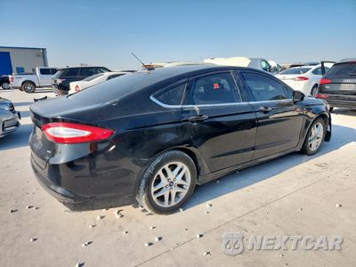 Trzecie zdjęcie samochodu z tyłu: 2016 FORD FUSION SE VIN:3FA6P0H77GR217553 - miniatura