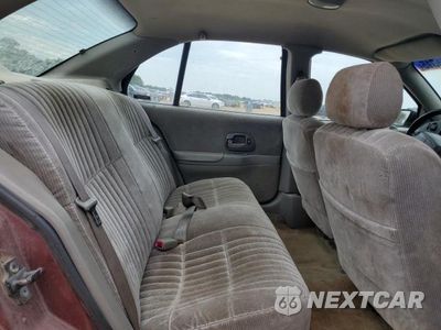 Zdjęcie 10 z 12 samochodu: 2001 CHEVROLET LUMINA VIN:2G1WL52J011254665 - miniatura