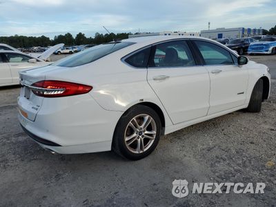 Trzecie zdjęcie samochodu z tyłu: 2018 FORD FUSION SE HYBRID VIN:3FA6P0LU5JR171726 - miniatura